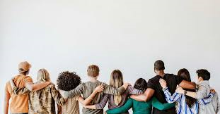 Image of people sitting with arm interlocked behind their backs. 