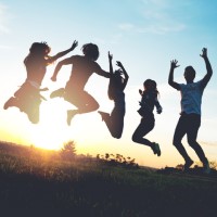 Picture of people jumping together. 